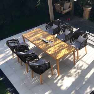 Tropischer Patio-Esszimmer-Armlehnsessel in Braun mit natürlicher Holzbasis - Teak PE geflochtenes Rattan 8-teiliges Set