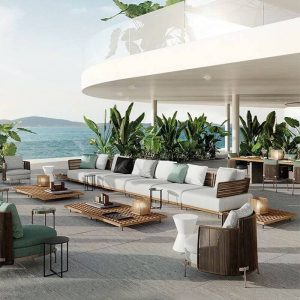 Braune wasserdichte Rattan-Outdoor-Sofa im tropischen Stil mit abnehmbarem Kissen - Quadratischer Teetisch